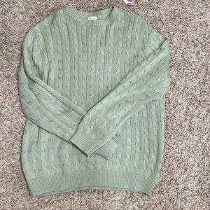 Women’s light green sweater